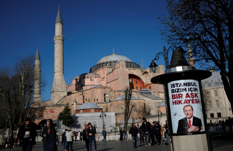 An election banner of Turkish President Tayyip Erdogan, with the Byzantine-era monument of Hagia Sophia in the background, is pictured in Istanbul
