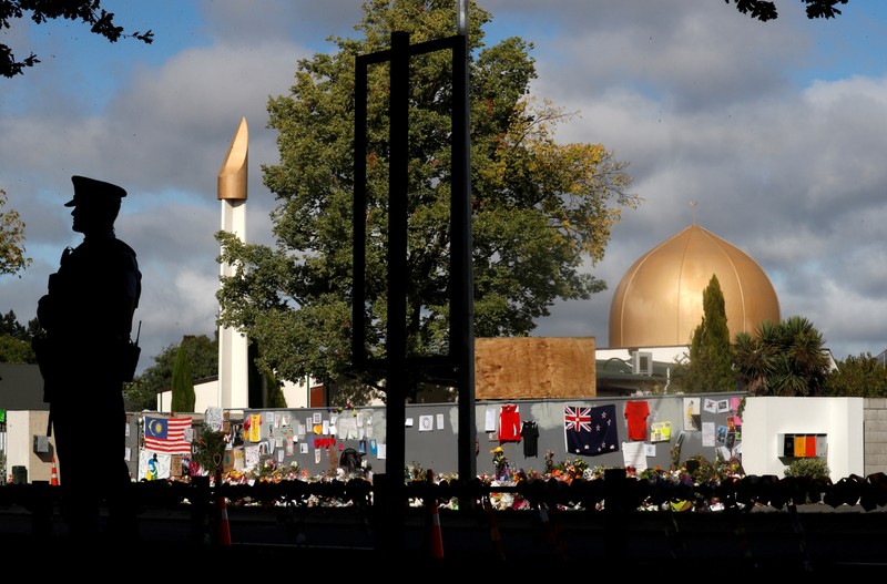 FILE PHOTO: A police officer stands guard outside Al Noor mosque in Christchurch