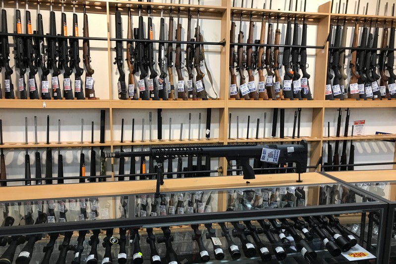FILE PHOTO: Firearms and accessories are displayed in a gunshop in Christchurch