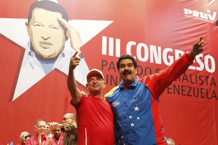 FILE PHOTO: Venezuela's President Maduro embraces retired General Carvajal as they attend the Socialist party congress in Caracas