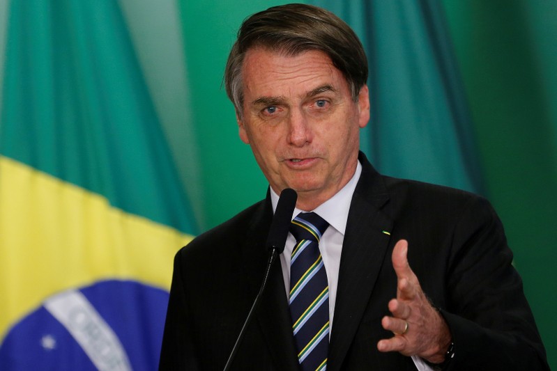 FILE PHOTO: Brazil's President Jair Bolsonaro speaks during inauguration ceremony of the new Education Minister Abraham Weintraub at the Planalto Palace in Brasilia