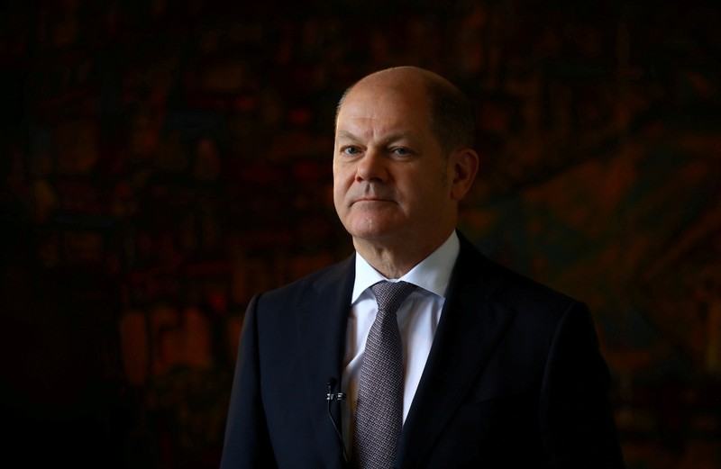 FILE PHOTO: German Finance Minister Olaf Scholz attends a Reuters interview in Berlin