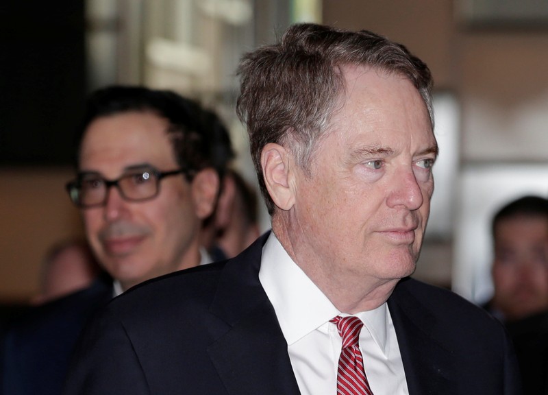 Members of the U.S. trade delegation Robert Lighthizer and Steven Mnuchin arrive at a hotel in Beijing