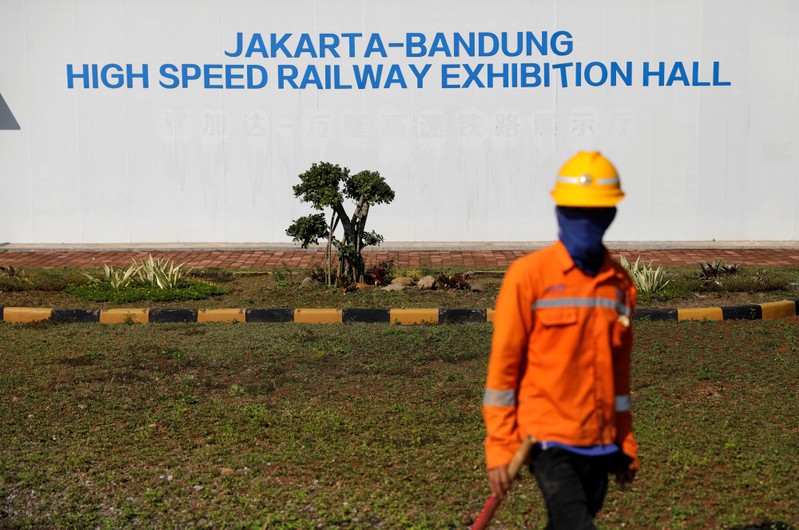 Worker stands in front of Jakarta-Bandung High Speed Railway exhibition hall at Walini tunnel construction site in West Bandung regency