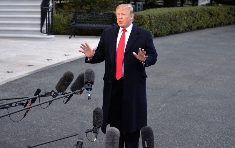 U.S. President Trump makes brief remarks to the press on Special Counsel Mueller's investigation as he arrives on the South Lawn of the White House in Washington