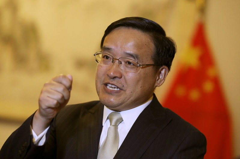 Jia Guide, China's ambassador to Peru, speaks during an interview with Reuters at the Chinese embassy in Lima