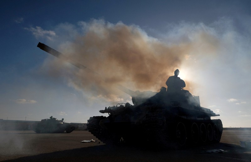 FILE PHOTO: Members of Libyan National Army (LNA) commanded by Khalifa Haftar, get ready before heading out of Benghazi to reinforce the troops advancing to Tripoli, in Benghazi