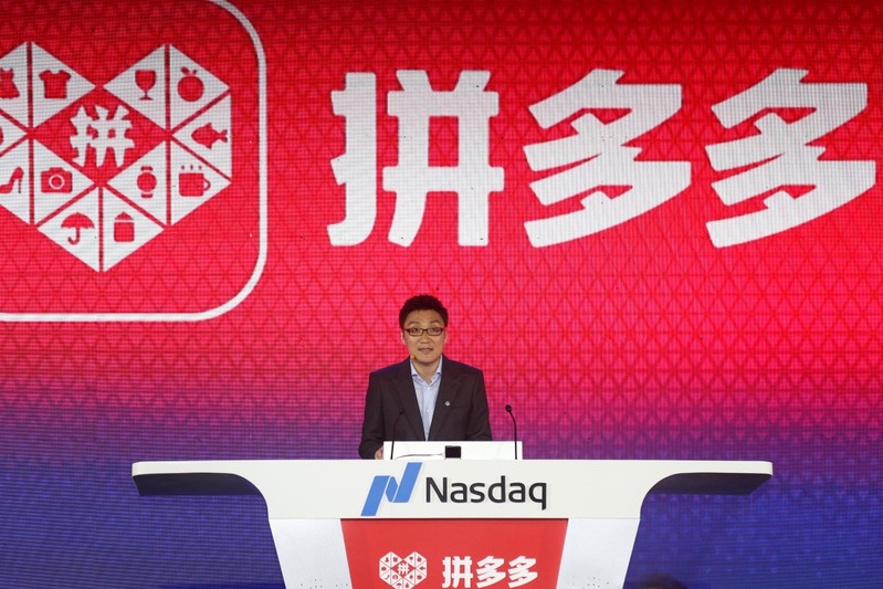 Colin Huang, founder and CEO of the online group discounter Pinduoduo, speaks during the company's stock trading debut at the Nasdaq Stock Market in New York, during an event in Shanghai