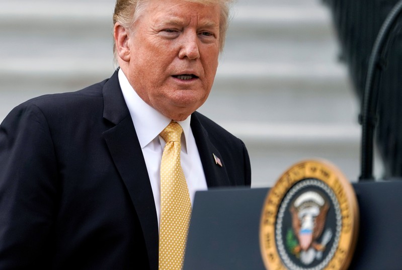 U.S. President Donald Trump arrives for an event honoring 2018 NASCAR Cup Series Champion Joey Logano in Washington