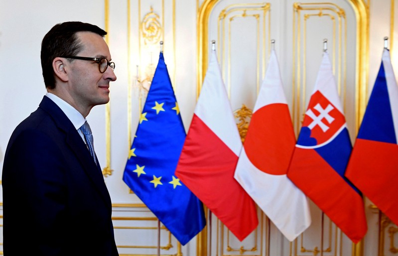 FILE PHOTO: Polish Prime Minister Mateusz Morawiecki arrives at a summit of the Visegrad Group of central European nations and Japan in Bratislava