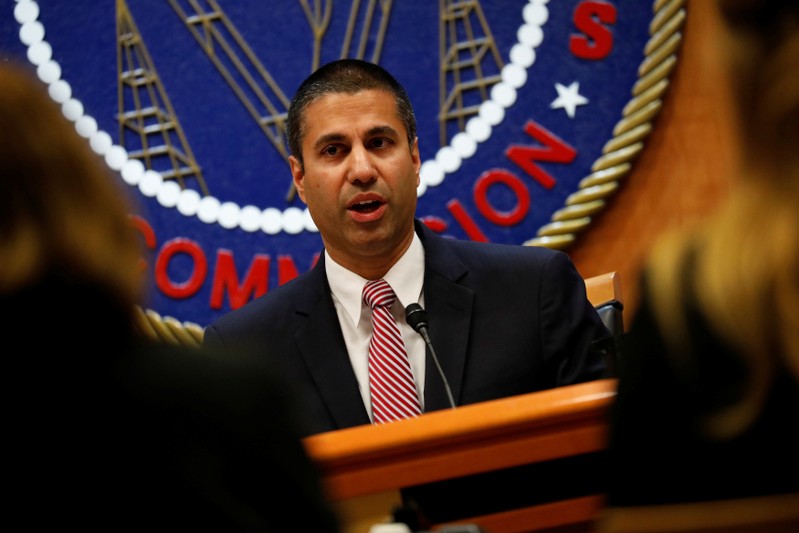 FILE PHOTO: Chairman Ajit Pai speaks ahead of the vote on the repeal of so called net neutrality rules at the Federal Communications Commission in Washington