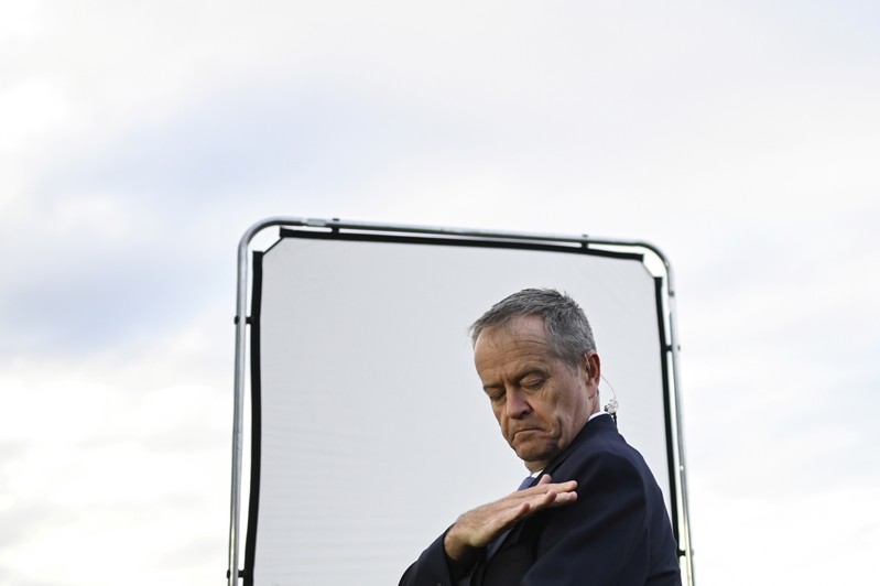 Australian Opposition Leader Bill Shorten is seen waiting for the start of a morning TV show interview after a visit to the Sydney Markets in Sydney
