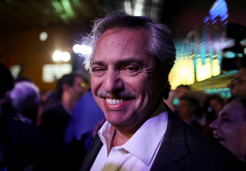 FILE PHOTO: Presidential candidate Alberto Fernandez of the Unidad Ciudadana party, smiles during a rally in Buenos Aires