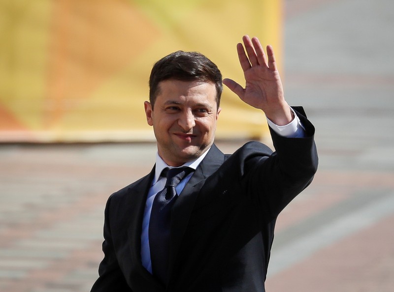Ukraine's President-elect Volodymyr Zelenskiy walks to take the oath of office ahead of his inauguration ceremony in the parliament hall, in Kiev