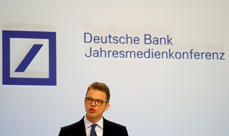 FILE PHOTO: Christian Sewing, CEO of Deutsche Bank AG, addresses the media during the bank's annual news conference in Frankfurt