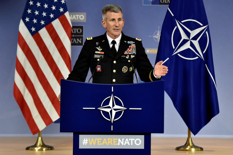 FILE PHOTO: U.S. General Nicholson holds a news conference after a NAC defence ministers meeting in Brussels