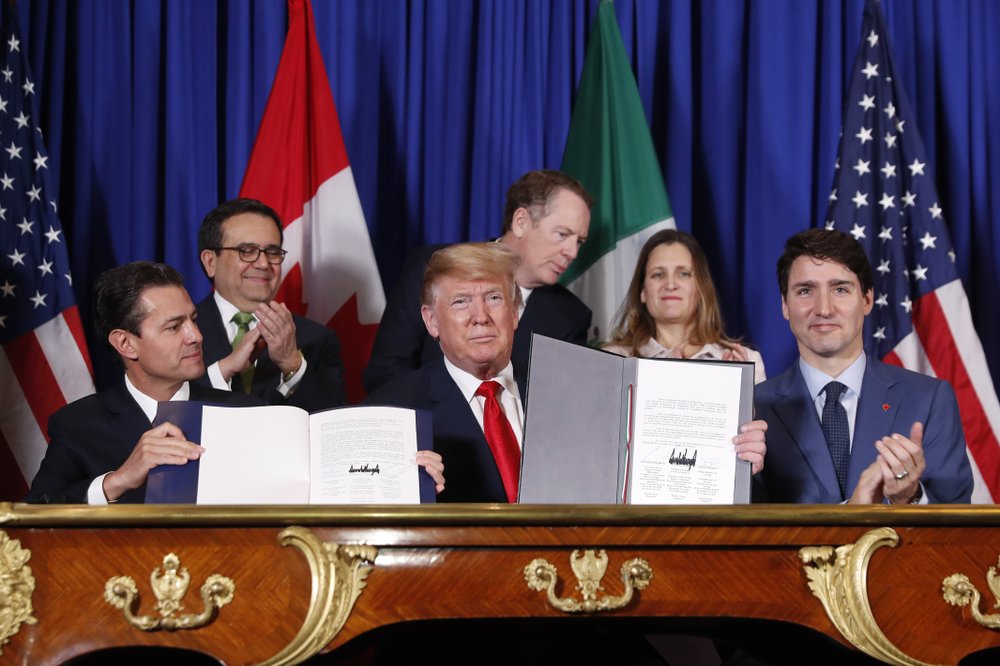 Donald Trump signs the phase one trade deal