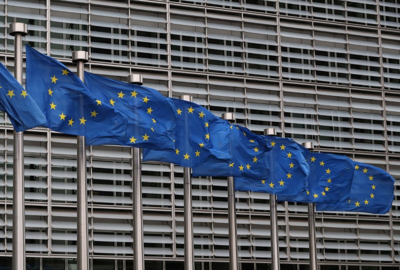 FILE PHOTO: European Union flags fly near the European Commission headquarters in Brussels