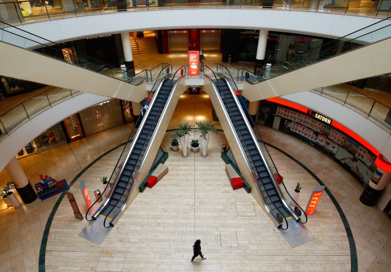 A person is seen inside an empty shopping mall during a partial lockdown in Leverkusen