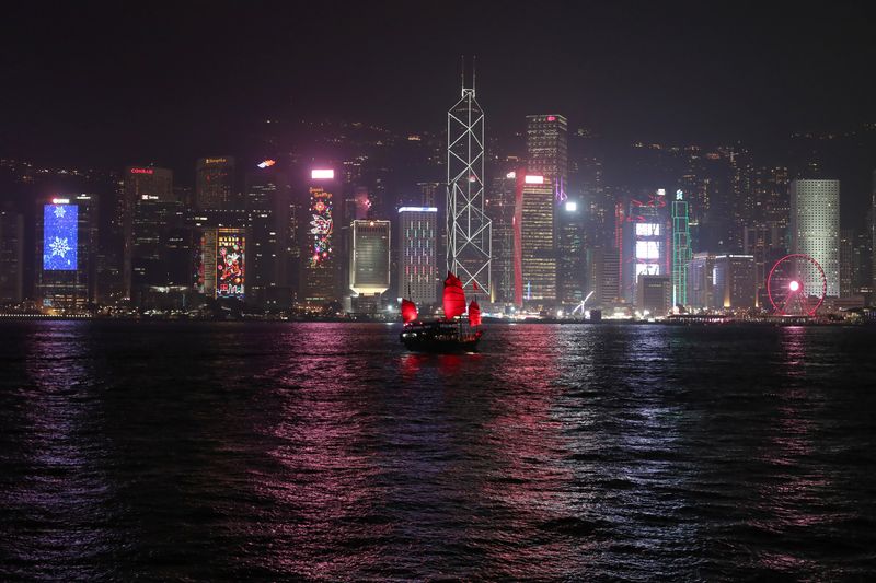 The Hong Kong skyline is lit up on Christmas Eve in Hong Kong