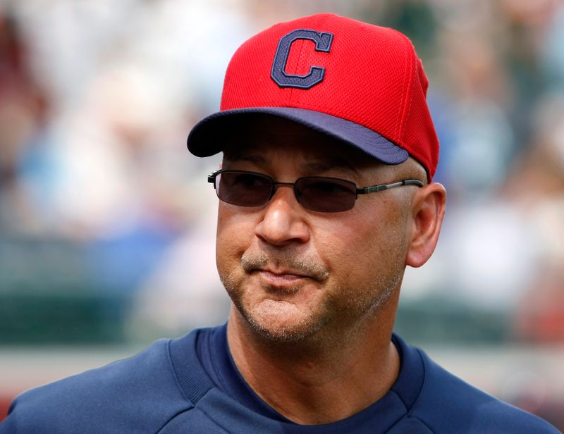Indians' Terry Francona looks on during their MLB Cactus League spring training baseball game against the Giants in Scottsdale