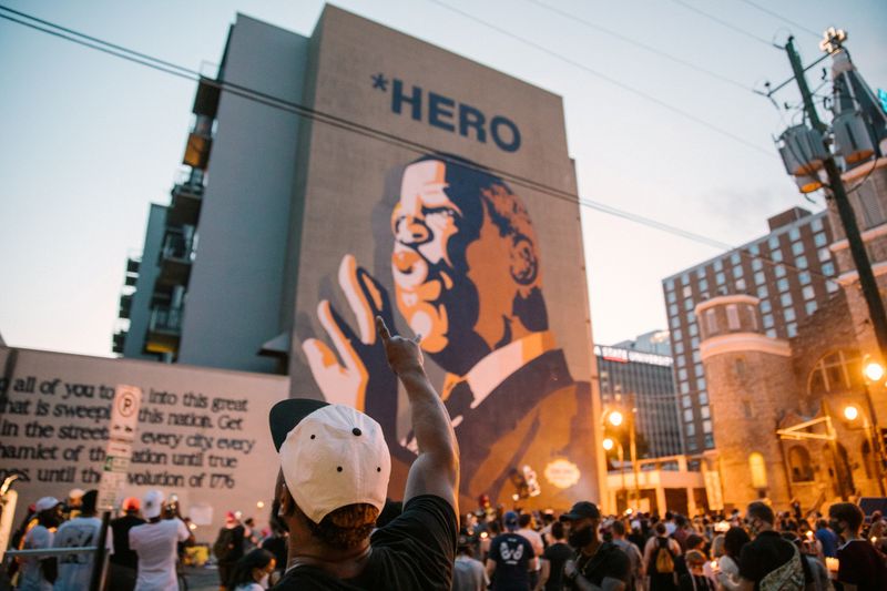FILE PHOTO: Mourners of the late Rep. John Lewis hold a vigil in his memory in Atlanta