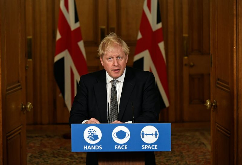 Britain's Prime Minister Boris Johnson speaks during a press conference at 10 Downing Street in London