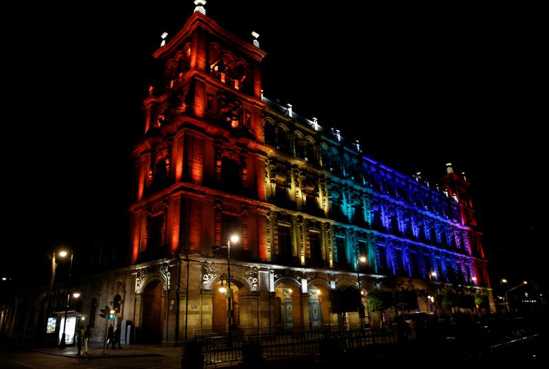 FILE PHOTO: The colors of the Pride rainbow flag symbolizing gay rights, are projected on a building, after a Gay Pride Parade, in downtown Mexico City