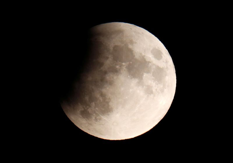 A partial lunar eclipse is seen in Berlin