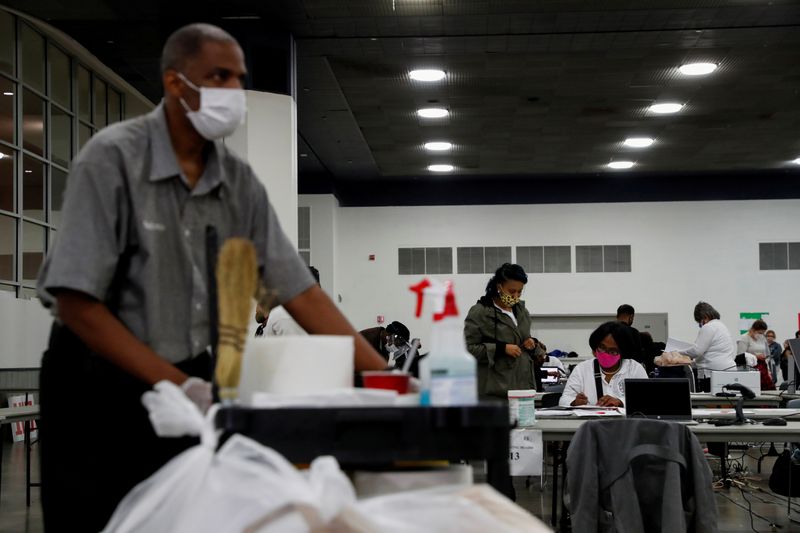 FILE PHOTO: Votes continue to be counted at the TCF Center the day after the 2020 U.S. presidential election, in Detroit, Michigan